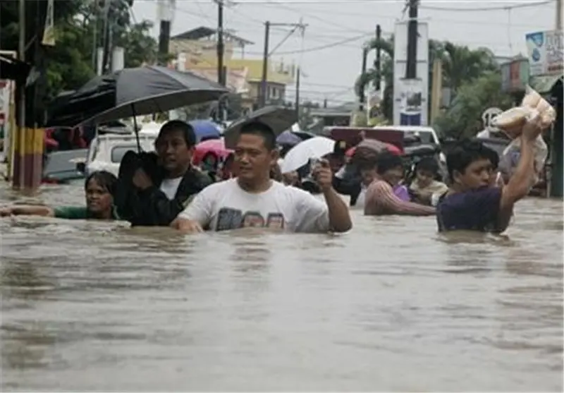 بارانبارینی بەخوڕ بەهۆی زریانەکەوە شەقامەکانی فیلیپین ژێرئاوکەوت
